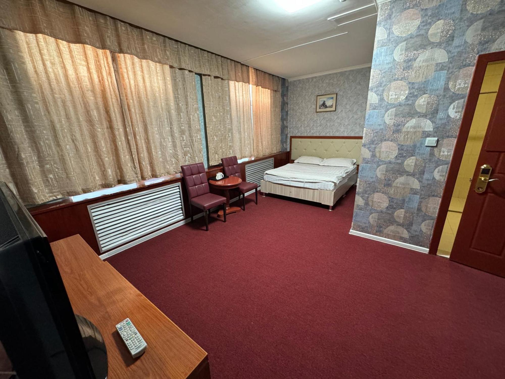 Zolotoi Drakon Hotel Алмати Екстер'єр фото