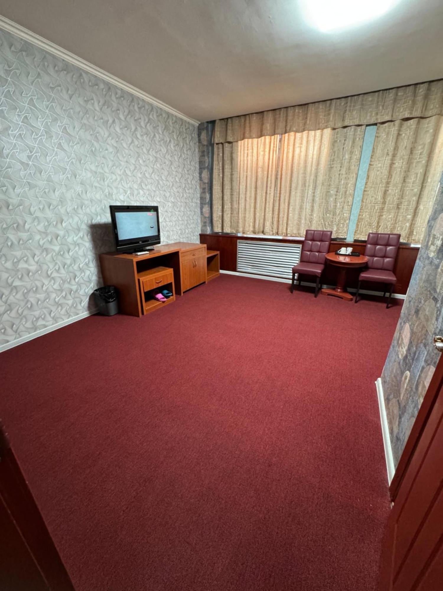 Zolotoi Drakon Hotel Алмати Екстер'єр фото