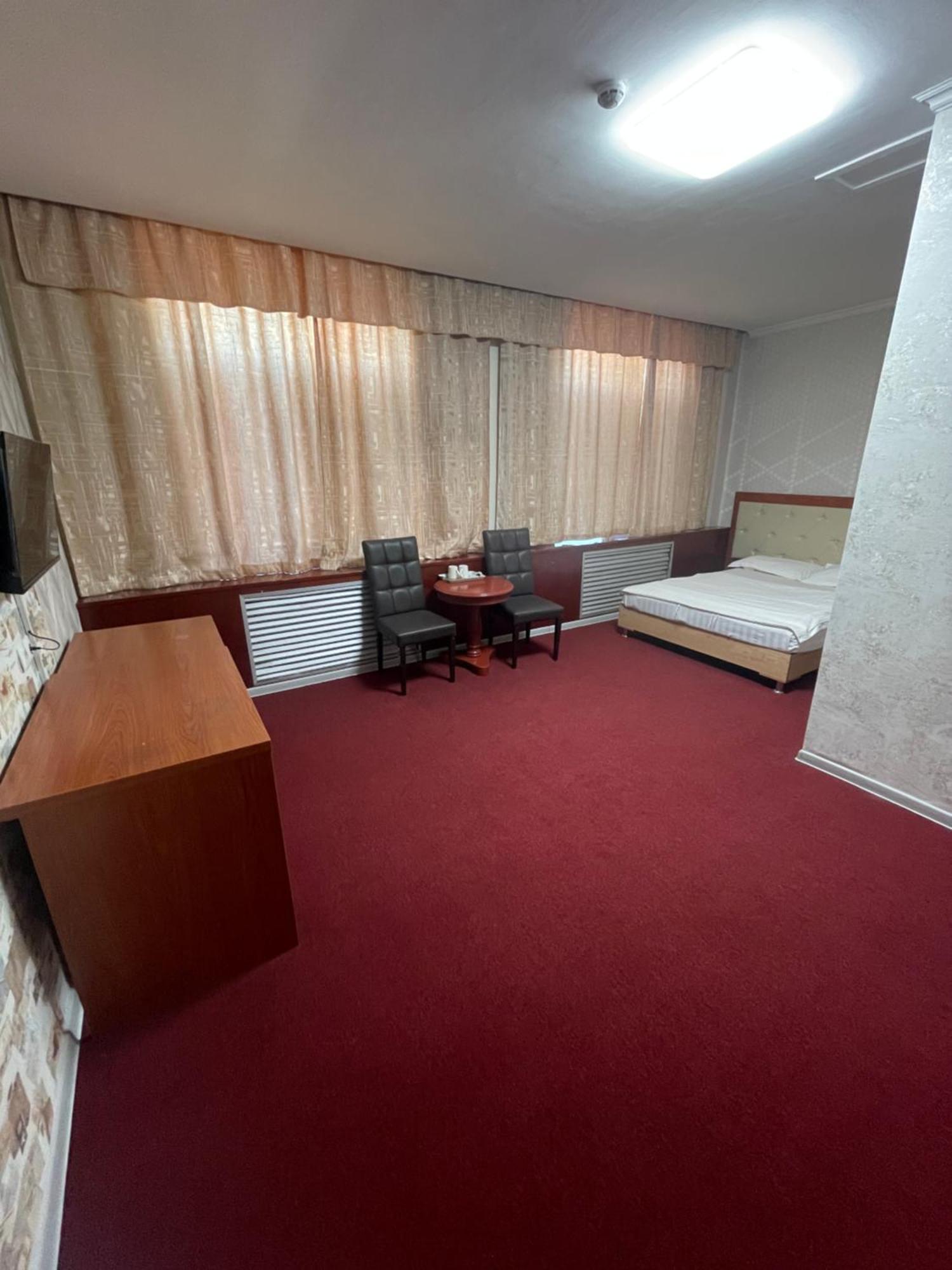 Zolotoi Drakon Hotel Алмати Екстер'єр фото