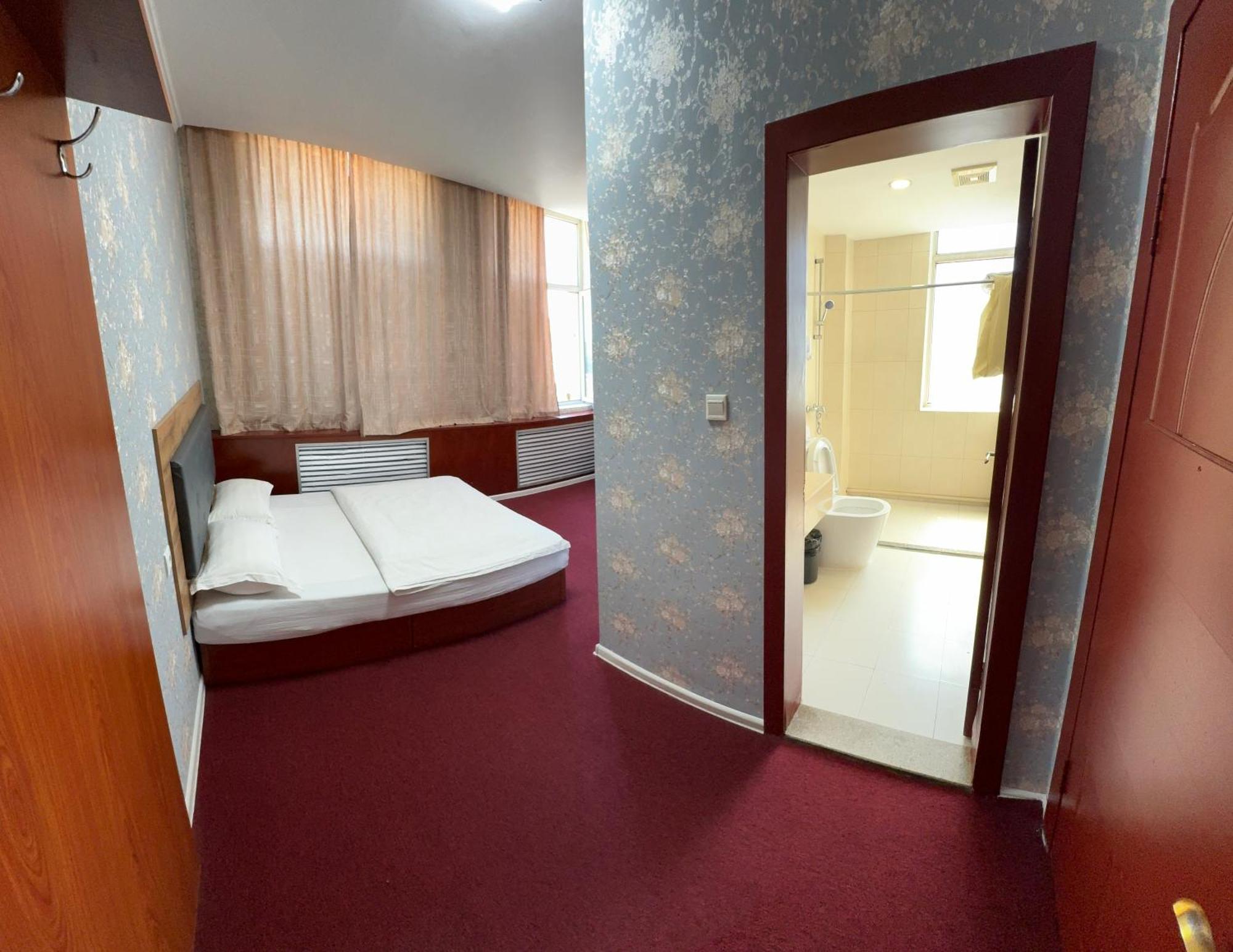 Zolotoi Drakon Hotel Алмати Екстер'єр фото
